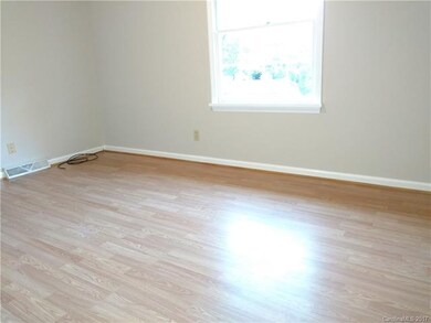 Front Bedroom has Ceiling Fan, Wood Laminate Floor