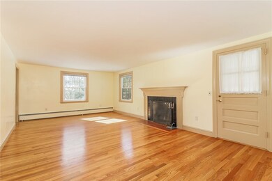 Living room opens to a screened in porch