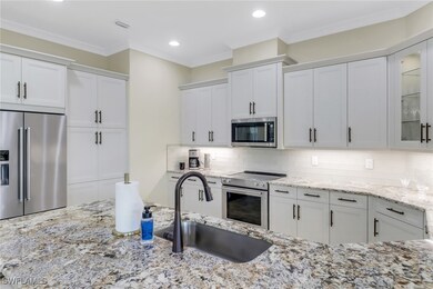 Kitchen featuring appliances with stainless steel