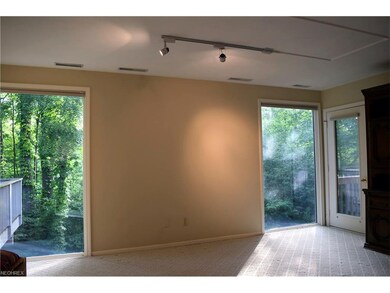 Living Room from Fireplace with door at right to w