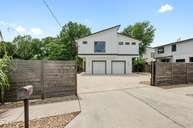 View of side of home featuring an attached garage