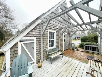side deck.pergula.brick walkway to garag
