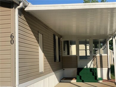 View of Sunroom from carport.