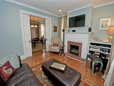 Living Room. Original details with built-in bookca