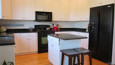 Kitchen with Granite Countertops and Bar. Eat-in A