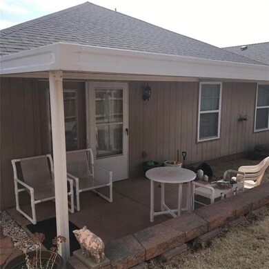 COVERED BACK PATIO FOR YOUR ENJOYMENT