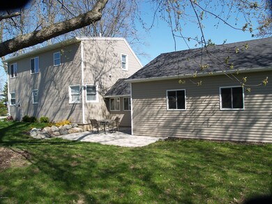 Fenced in Back Yard with Cement Patio