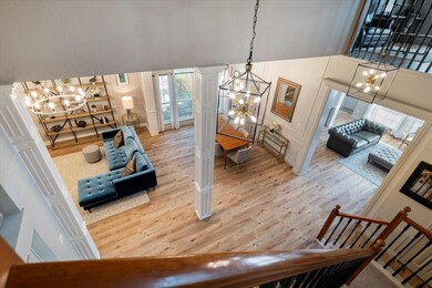 View of Foyer, Living, and Dining area from 2nd level