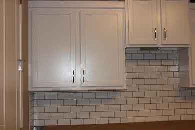 Beautiful Cabinets with subway tile