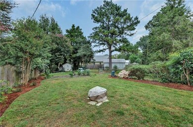 Large yard for gardening and pups.
