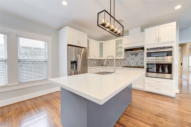 Spacious open kitchen, high end appliances include