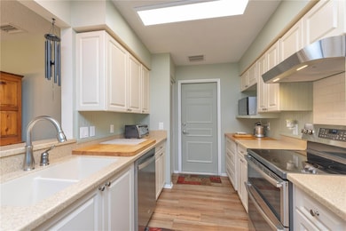Pass through window to the dining room.