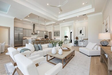 The open concept main living area features white o