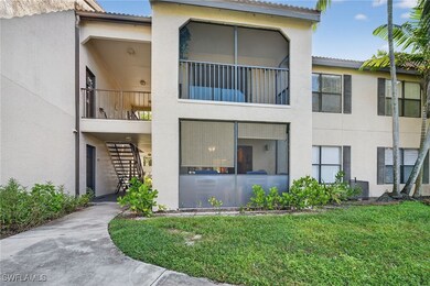 Back of house with stairway, stucco siding, Lanai