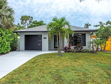 View of front of home featuring a front yard and a
