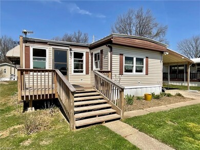 Front entrance to home with spacious deck. Easy st