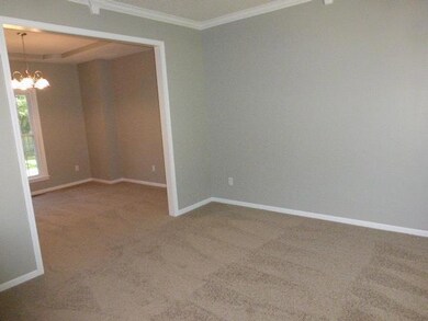 Formal living room, or den/study.