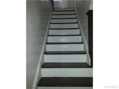 Living Room STAIRCASE TO UPPER LEVEL