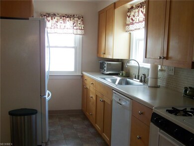 Sleek and functional kitchen with maple cabinets, 