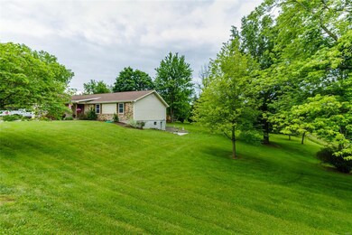 A view of the side yard on this 1.14 acre lot.  Th
