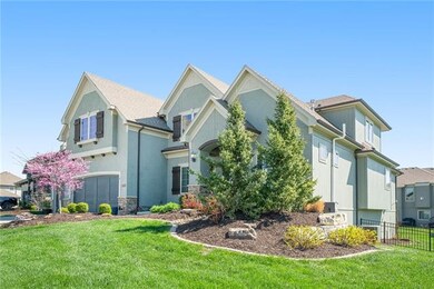This former model has extensive landscaping!