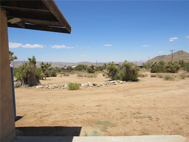 Looking north from the front patio of the house.