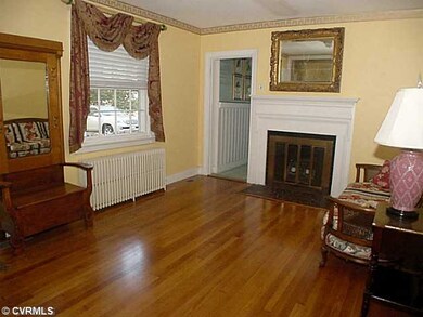 Living Room - Beautiful Morgan mantle and doorway 