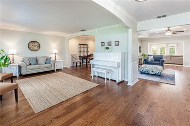 Engineered hardwood floors throughout. 