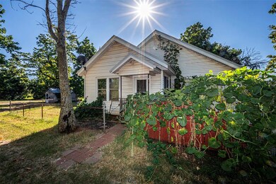 View of front of property featuring a front lawn