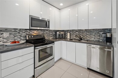 Kitchen with Granite Counter tops, stainless appliances and coordinating back splash