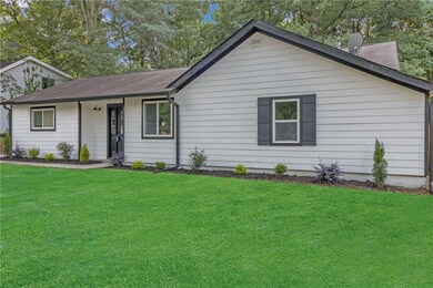 Ranch-style home with a front yard