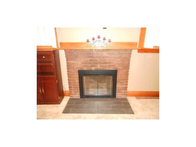 Living Room. Snuggle up to the fireplace with a go