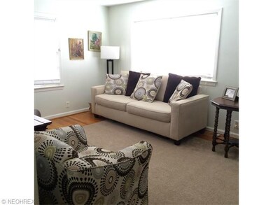 A view of the Living Room with hard wood floors
