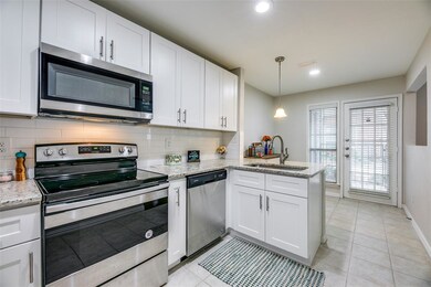 Eat in kitchen with patio off