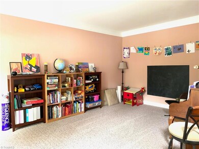 Living Room is very spacious, currently being used as playroom.