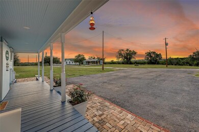 Wooden porch with a yard