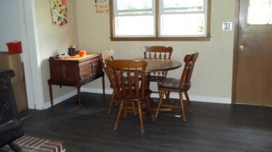 A dining area adjoins the kitchen. Open into the living room.
