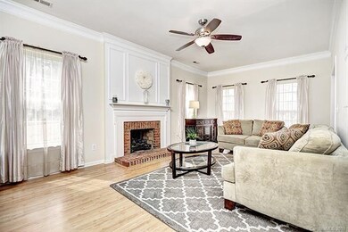 Great room features a gas log fireplace