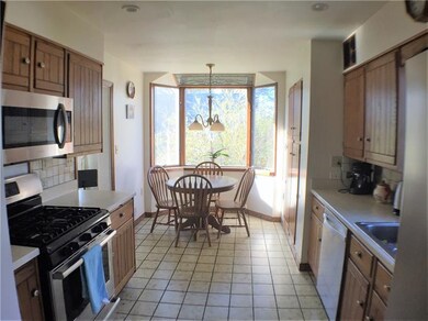 Eat in kitchen with a breakfast nook and newer sta