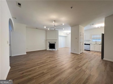 Large Great Room offers a romantic fireplace w/gas