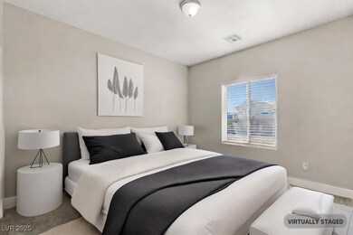 Bedroom with visible vents and baseboards