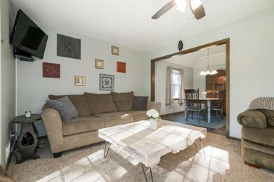 Living room connects to the formal dining room!