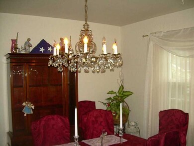 Dining Room. A gorgeous antique crystal chandelier