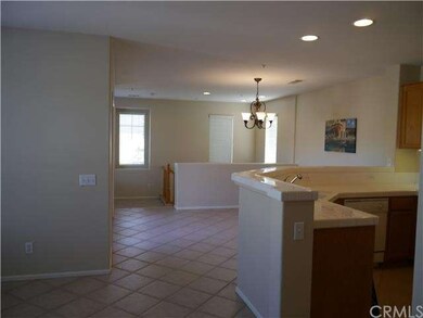 View of Dining Area & Kitchen