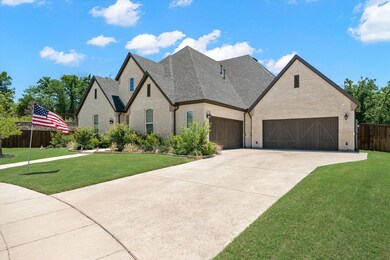 This beautiful estate home showcases a stunning fr