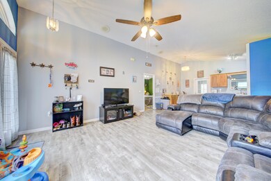 living room with vaulted ceiling