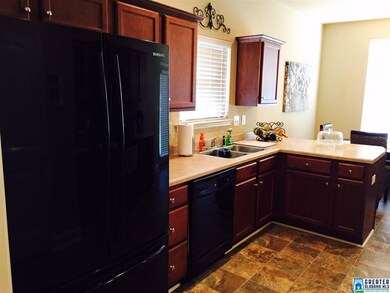 Beautiful cabinetry, double stainless steel sink