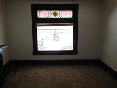 Living Room. Original Stain Glass Window
