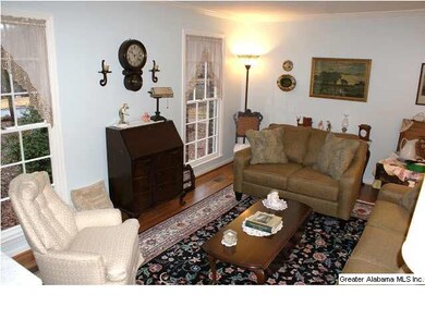 SPACIOUS LIVING ROOM OR POTENTIAL OFFICE WITH HARD