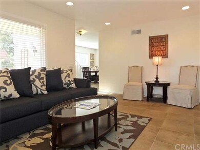 Living room enjoys views of front patio